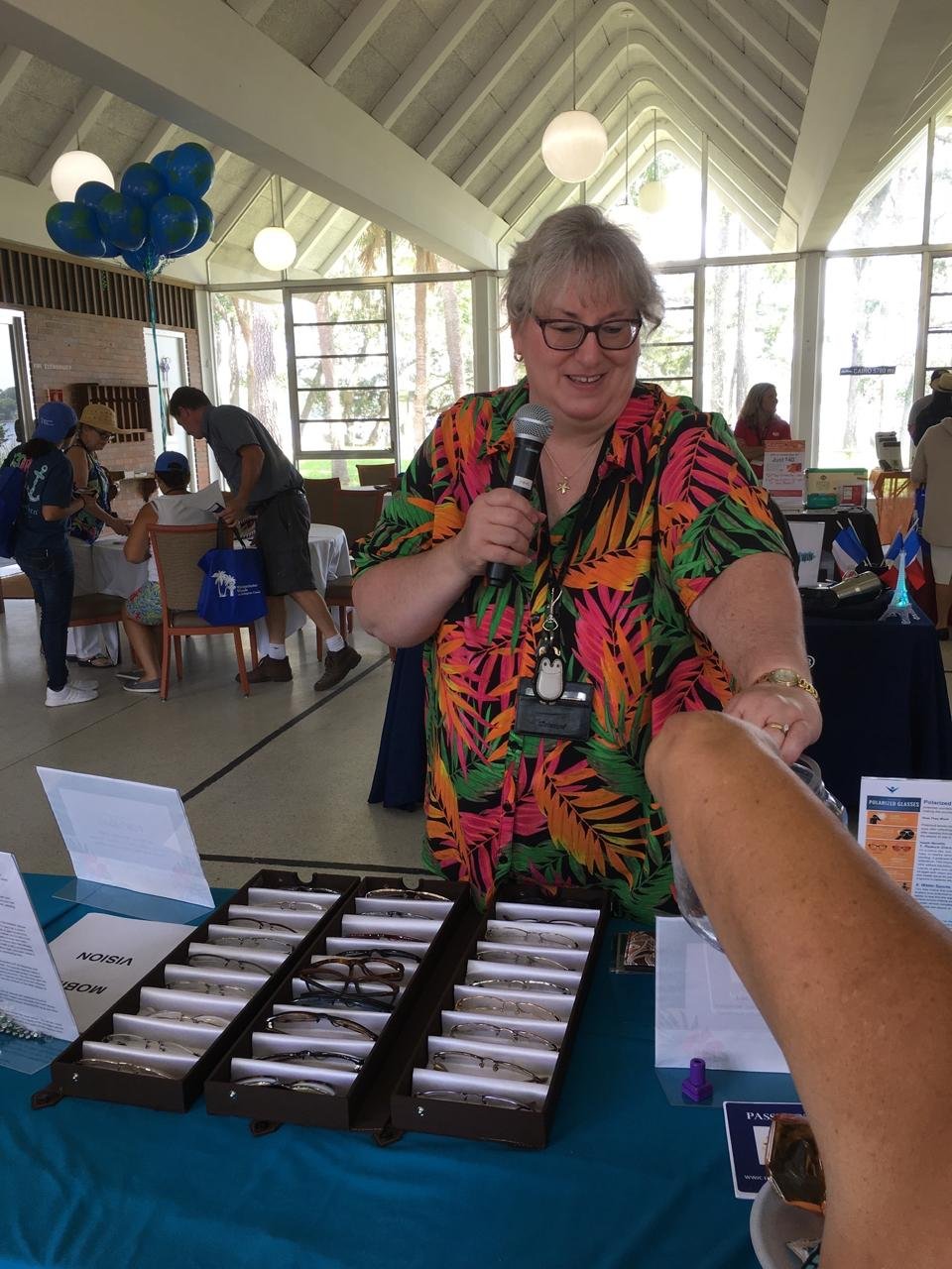 On Site Optical at a community event with frames on display